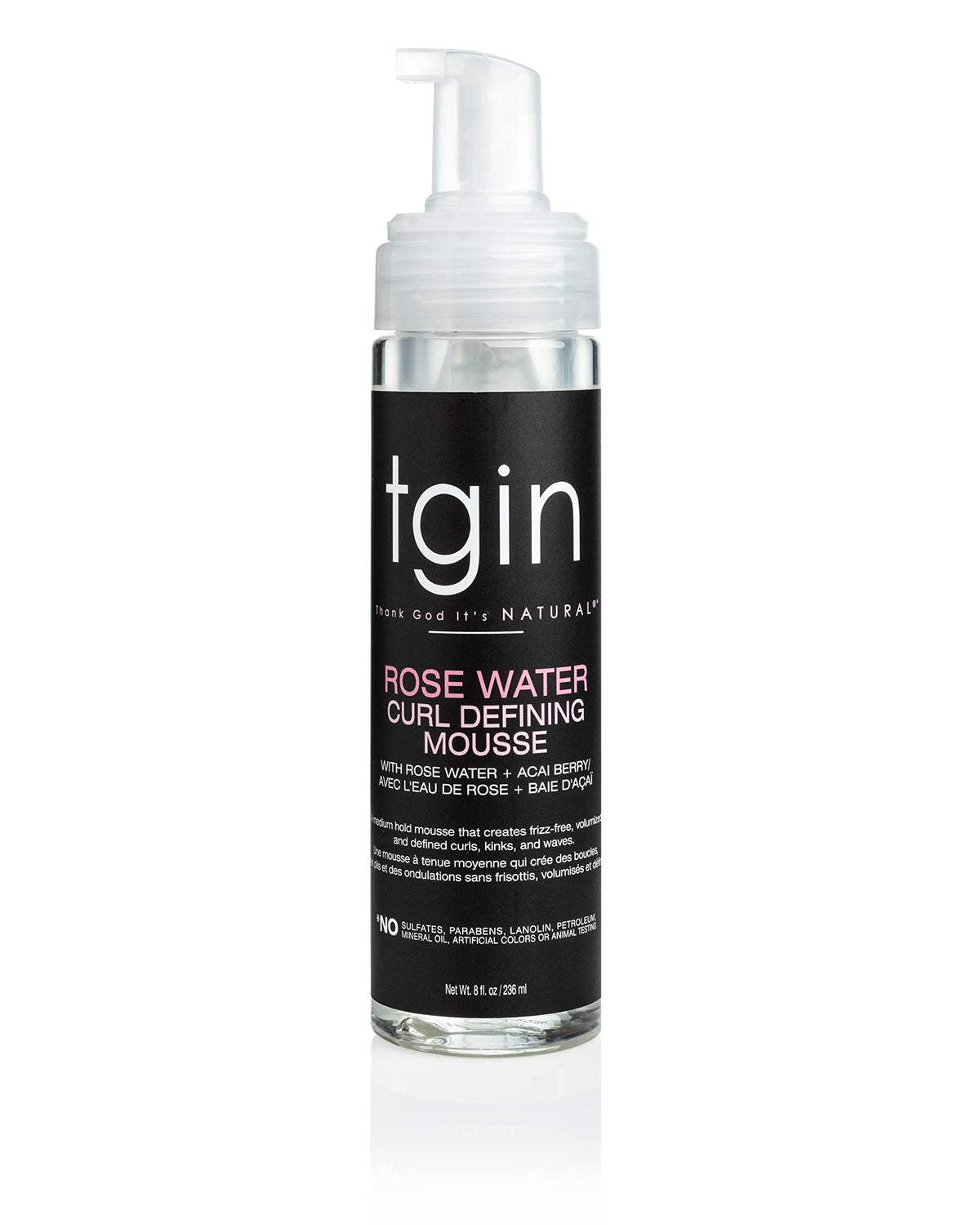 Mousse tgin para definición de rizos con agua de rosa en botella clara.