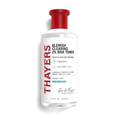 Tónico THAYERS para imperfecciones, botella clara y diseño minimalista.