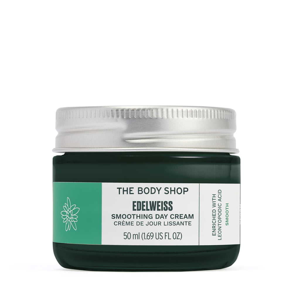The Body Shop Edelweiss Crema de Día en tarro, textura suave para hidratación.