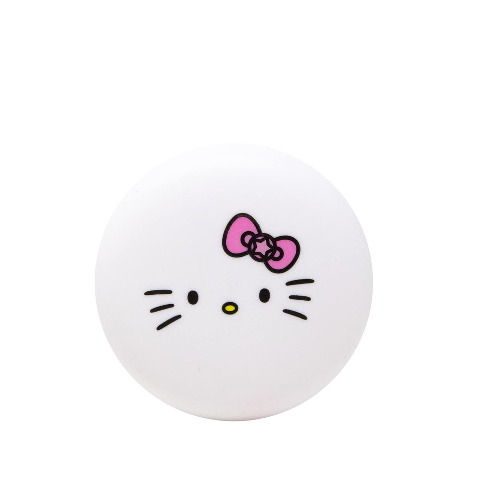 Hello Kitty en tarro del bálsamo, aroma pastel ideal para labios suaves.