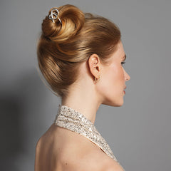 The Hair Edit Pin de chignon anudado: se desliza con facilidad para recogidos rápidos.