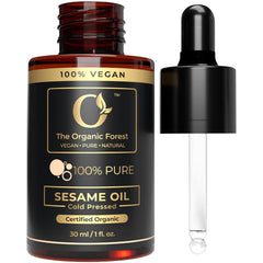 The Organic Forest Aceite de sésamo prensado en frío en botella para piel radiante.