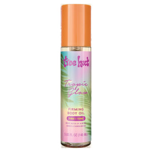 Tree Hut Tropic Glow aceites corporales derramándose para hidratación rápida.