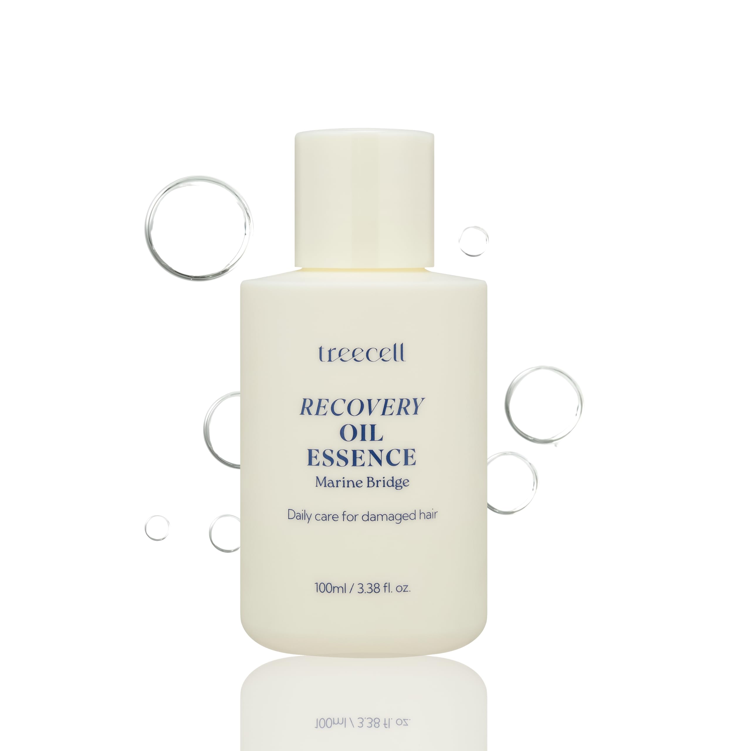 Treecell Recovery Oil Essence: botella cercana mostrando protección y brillo sin residuo.