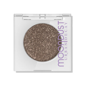 Sombra Moondust de Urban Decay con brillo microfin para un destello refinado.