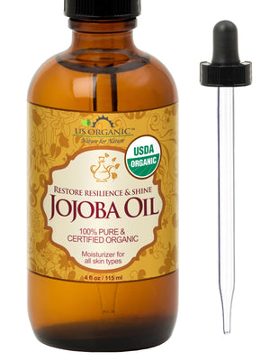 Aceite de jojoba US Organic en botella, vertido para uso suave en piel