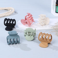 USDNICE clips pequeños para cabello, color negro, muestra versatilidad y sujeción discreta.
