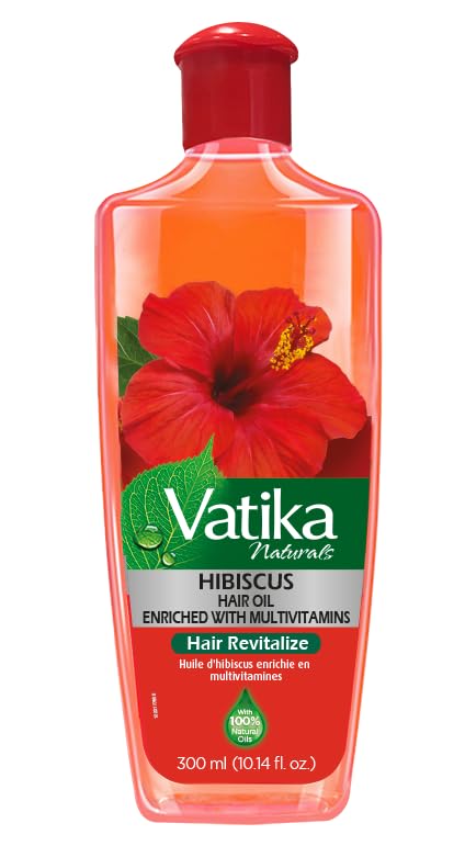 Vatika Naturals Aceite Multivitaminas en botella para fortalecimiento capilar.