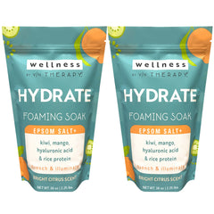 Village Naturals Therapy Hydrate, botella de espuma para baño con aroma cítrico.