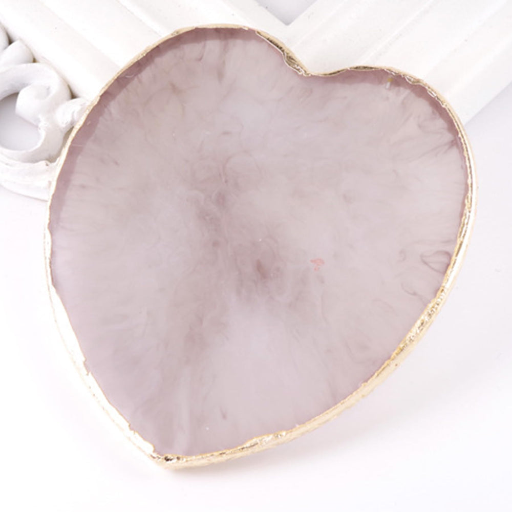 Waldd paleta con corazones añade encanto al arte de uñas.