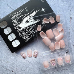 Uñas francesas rosadas de WBRRFJJ con detalles plateados.