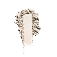 Textura horneada de Well People Superpowder que difumina imperfecciones.