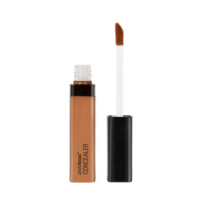Corrector Wet n Wild tono cacao oscuro, empaque y aplicador para retoques faciales diarios
