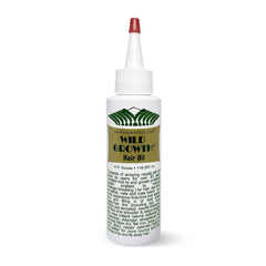 Wild Growth Aceite capilar en frasco para hidratación profunda y cabello suave.