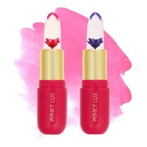 Winky Lux Balsamo Floral con flor de crisantemo visible, tono rosado personalizado para labios.