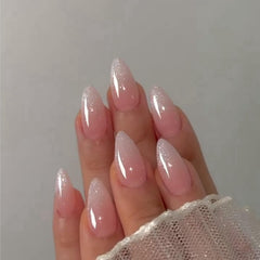 XCREANDO Glitter Ombré Rosa en uñas almendra medias para fiesta o evento.
