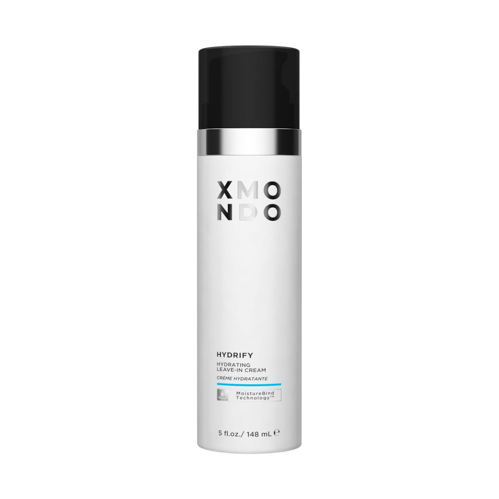 XMONDO Hidrify crema sin enjuague, enfoque en envase frontal, ofrece hidratación profunda y manejo suave