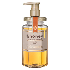 Champú & Honey hidrata profundamente, enfoque en la botella.