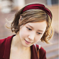 Yeshan diadema de seda satinada, ideal para combinar con looks deportivos.