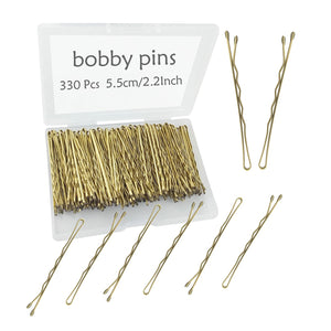Pinzas para el pelo YINGFENG en primer plano, agarre firme y acabado dorado.